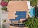 This home features solar panels, a private backyard pool and spa, surrounded by lush landscaping, and is on a well-maintained lot at 10367 E Wood Dr, Scottsdale, AZ 85260
