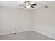 An empty bedroom featuring tile floors and a ceiling fan for added comfort at 10367 E Wood Dr, Scottsdale, AZ 85260