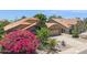 Beautiful single-story home with a well-kept desert front yard and attached garage at 10367 E Wood Dr, Scottsdale, AZ 85260