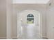 Open hallway featuring tiled floors and neutral-colored walls at 10367 E Wood Dr, Scottsdale, AZ 85260