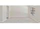 This is a well-lit room with neutral colors and tiled flooring, featuring a window with an exterior view at 10367 E Wood Dr, Scottsdale, AZ 85260