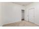 This bedroom features neutral walls, carpet flooring, and a closet at 10850 W Avenida Del Rey --, Peoria, AZ 85383
