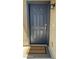 An elegant front door, trimmed in blue, with a 'Welcome Home' doormat at 10850 W Avenida Del Rey --, Peoria, AZ 85383