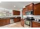 Spacious kitchen with stainless steel appliances and granite countertops at 10850 W Avenida Del Rey --, Peoria, AZ 85383