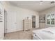 Main bedroom showing walk in closet, neutral walls, and a carpet floor at 10850 W Avenida Del Rey --, Peoria, AZ 85383