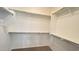Spacious walk-in closet provides ample storage space with shelving and closet rod at 10850 W Avenida Del Rey --, Peoria, AZ 85383