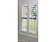 A close-up of windows fitted with white plantation shutters at 10850 W Avenida Del Rey --, Peoria, AZ 85383
