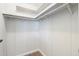Walk-in closet featuring shelving and laminate wood-look floors at 11411 N 91St Ave Ave # 87, Peoria, AZ 85345