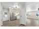 Bright kitchen features stainless steel appliances, white cabinetry, and modern lighting at 11411 N 91St Ave Ave # 87, Peoria, AZ 85345