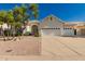 Beautiful single-story home with a three-car garage and mature landscaping in a well-maintained neighborhood at 1213 W Beck Ln, Phoenix, AZ 85023