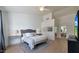 Serene main bedroom with a calming color scheme, wood floors, and access to an ensuite bathroom and walk-in closet at 1213 W Beck Ln, Phoenix, AZ 85023