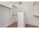Spacious walk-in closet with custom shelving and ample hanging space for organization at 1213 W Beck Ln, Phoenix, AZ 85023