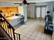 Open concept living area with staircase and kitchen view at 1342 W Emerald Ave # 373, Mesa, AZ 85202