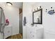 Updated bathroom featuring a modern vanity, shower, and stylish fixtures for a serene experience at 13842 N 40Th Ave, Phoenix, AZ 85053