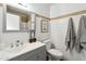 Well-lit bathroom featuring a stylish vanity and a shower with sliding glass door, offering a comfortable space at 13842 N 40Th Ave, Phoenix, AZ 85053