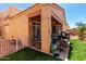Lovely backyard with synthetic grass, offering a low-maintenance outdoor space at 14428 W Moccasin Trl, Surprise, AZ 85374