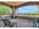 This balcony features a seating area and a view of the surrounding landscape at 14815 N Fountain Hills Blvd # 201, Fountain Hills, AZ 85268