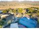 Community aerial view of park with playground, basketball court, picnic area, and well-maintained landscaping at 15252 N 100Th St # 1164, Scottsdale, AZ 85260