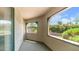 Outdoor balcony with views of lush trees and flowering bushes at 15252 N 100Th St # 1164, Scottsdale, AZ 85260