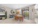 Dining area with wooden table set, fireplace, and access to the outdoor space at 15252 N 100Th St # 1164, Scottsdale, AZ 85260