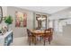 Bright dining area with wood table, chandelier and natural light at 15252 N 100Th St # 1164, Scottsdale, AZ 85260