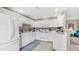 Bright kitchen with white appliances, ample counter space, and access to the living area at 15252 N 100Th St # 1164, Scottsdale, AZ 85260