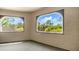Enclosed patio with decorative windows and views of lush landscaping at 15252 N 100Th St # 1164, Scottsdale, AZ 85260