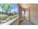 Relaxing patio area with views of mature trees and plants at 15252 N 100Th St # 1164, Scottsdale, AZ 85260