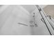 Close up shot of a glass enclosed shower with handheld showerhead and grab bars at 15252 N 100Th St # 1164, Scottsdale, AZ 85260