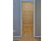 Walk-in closet with wire shelving and tile floors for organized storage space at 15354 W Caribbean Ln, Surprise, AZ 85379