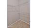 Spacious closet featuring wire shelving, tile floors, and neutral colored walls at 15354 W Caribbean Ln, Surprise, AZ 85379