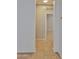 Hallway featuring neutral walls and tile flooring, leading to other rooms in the house at 15354 W Caribbean Ln, Surprise, AZ 85379