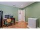 Well lit by window and ceiling light, this room also offers a peek into the hall at 16523 W Desert Bloom St, Goodyear, AZ 85338