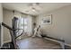 This room features equipment for a full body workout, perfect for an exercise enthusiast at 16523 W Desert Bloom St, Goodyear, AZ 85338