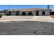 Charming ranch style home featuring an extended driveway and desert landscaping at 18045 N 20Th N Ln, Phoenix, AZ 85023