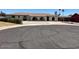 Single story home with desert landscaping, ample driveway, and large arched windows at 18045 N 20Th N Ln, Phoenix, AZ 85023