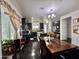 Eat in kitchen with dark cabinetry, stainless appliances and large window with natural light at 1812 S Racine Ln, Gilbert, AZ 85295