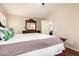 Bright main bedroom with a walk-in closet and soft, neutral colors at 2053 E Saddlebrook Ct, Gilbert, AZ 85298