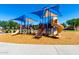 Playground equipment in a neighborhood park with slides and climbing structures at 2053 E Saddlebrook Ct, Gilbert, AZ 85298