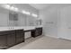 Primary bathroom with dual vanities, spacious mirrors, and tile flooring at 22788 E Orion Way, Queen Creek, AZ 85142