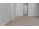 Open-concept living space featuring tile floors and neutral paint throughout at 22788 E Orion Way, Queen Creek, AZ 85142