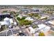 An aerial view showcases a historic water tower and nearby buildings, capturing the essence of a charming town center at 2338 E Javelina Ave, Mesa, AZ 85204