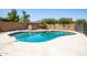 Backyard pool surrounded by a tiled patio and block fence, offering a private outdoor oasis at 2338 E Javelina Ave, Mesa, AZ 85204