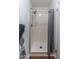 Bathroom featuring a shower stall with removable shower head and gray curtain at 2338 E Javelina Ave, Mesa, AZ 85204