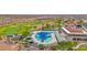 Aerial view of community pool and sunbathing area, great for relaxing and enjoying the sun at 27667 W Mohawk Ln, Buckeye, AZ 85396