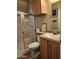 Bathroom featuring a vanity, toilet, shower, and window for natural light at 2929 E Main St # 601, Mesa, AZ 85213