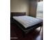 Bedroom featuring a modern bed frame and a comfortable mattress at 2929 E Main St # 601, Mesa, AZ 85213
