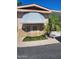 Charming home featuring stone accents, awning, and a well-maintained landscape at 2929 E Main St # 601, Mesa, AZ 85213