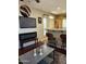 Well-appointed living room with breakfast bar, fireplace, and a flatscreen TV at 2929 E Main St # 601, Mesa, AZ 85213