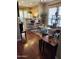 Bright living room featuring hardwood floors, breakfast bar, and stylish decor at 2929 E Main St # 601, Mesa, AZ 85213